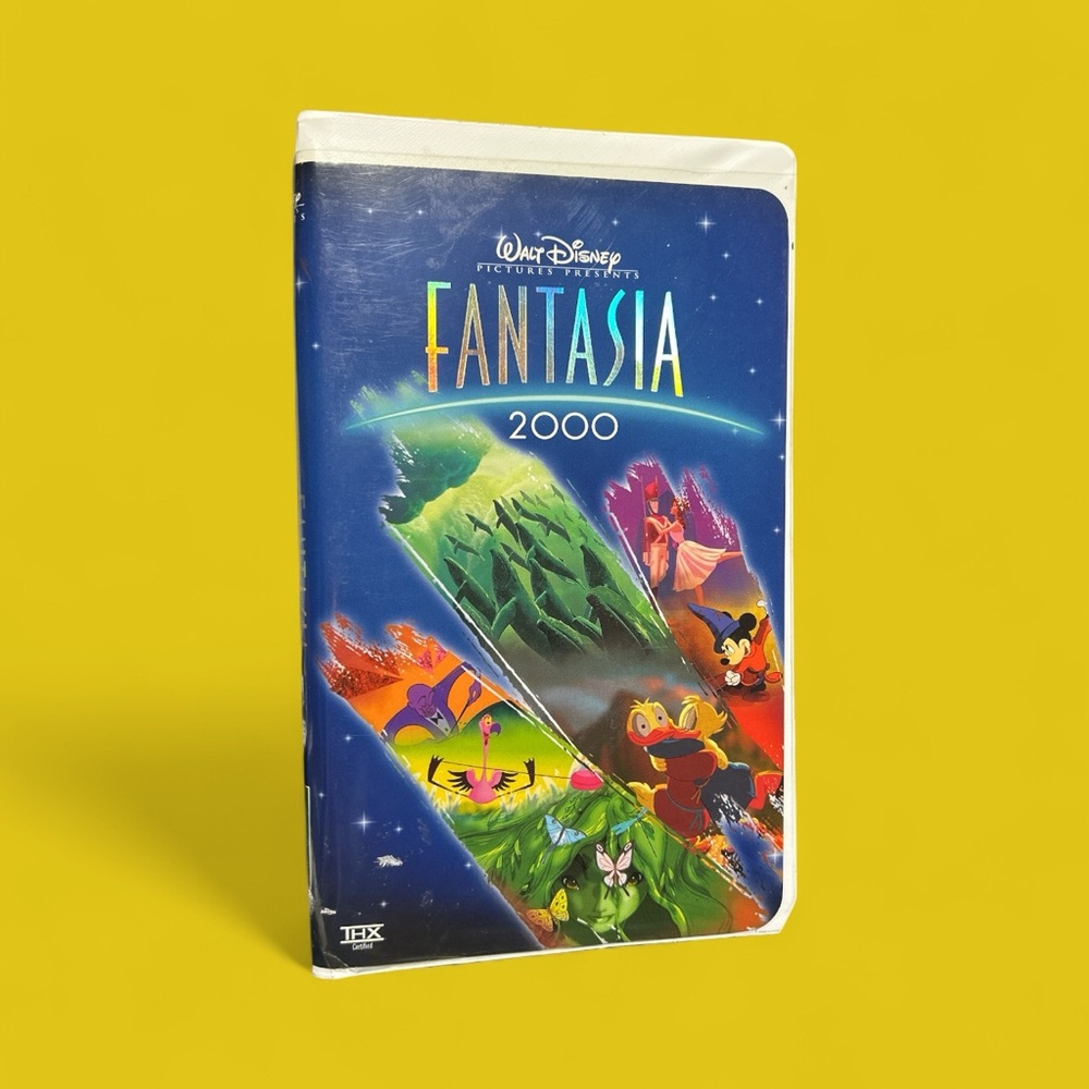 Disney Fantasia 2000 VHS with pristine commemorative booklet
